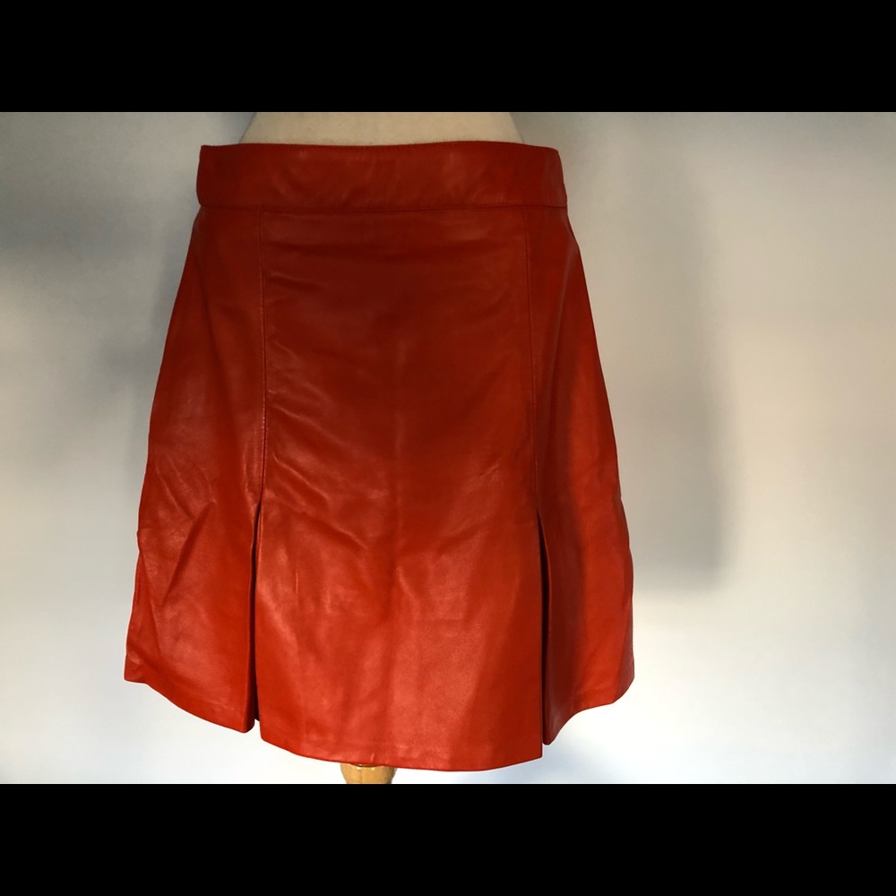 Orange leather skirt in lamb skin